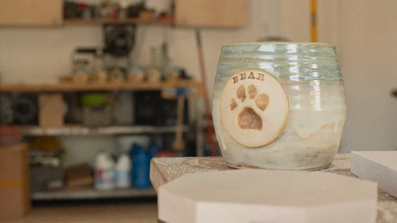 Image: artisan glazing a keepsake